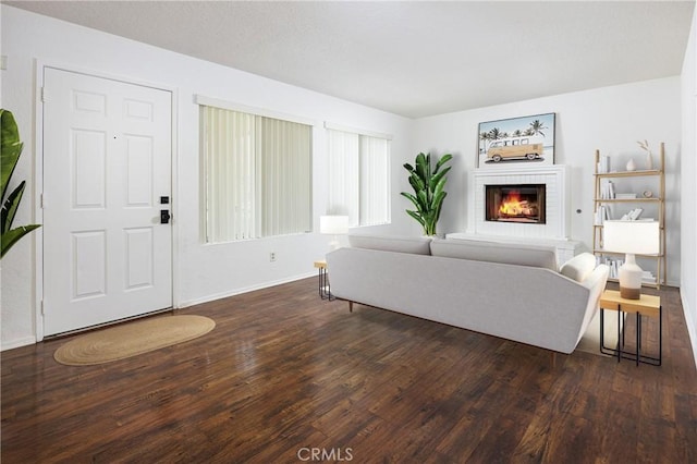 25644 Mont Pointe Unit 1A, Lake Forest, CA 92630 - living room with wood finished floors and a brick fireplace