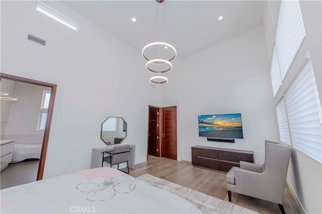 615 El Redondo Ave, Redondo Beach, CA 90277 - bedroom with a towering ceiling, wood finished floors, and recessed lighting
