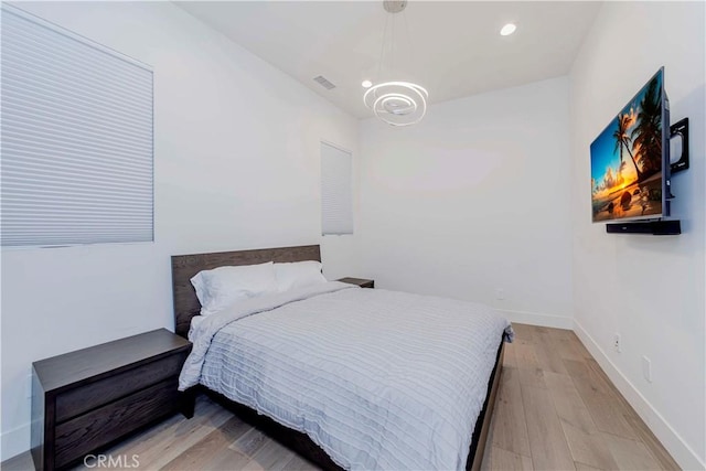 615 El Redondo Ave, Redondo Beach, CA 90277 - bedroom with a chandelier, wood finished floors, and recessed lighting