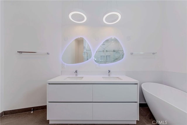615 El Redondo Ave, Redondo Beach, CA 90277 - bathroom featuring double vanity, a soaking tub, and a shower