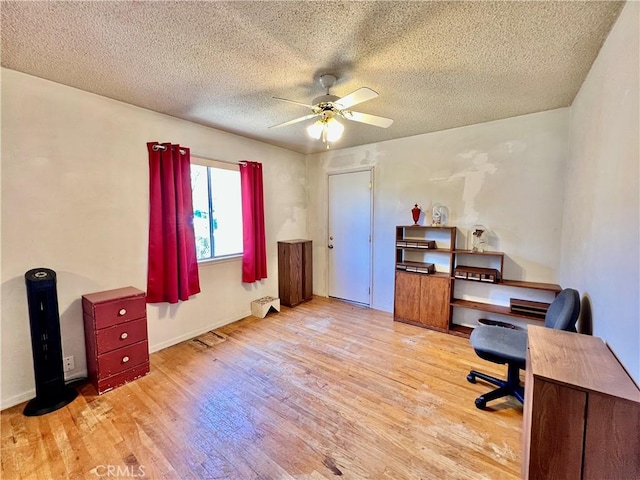 8675 Colorado Ave, Riverside, CA 92504 - office area with wood finished floors, a ceiling fan, and a textured ceiling