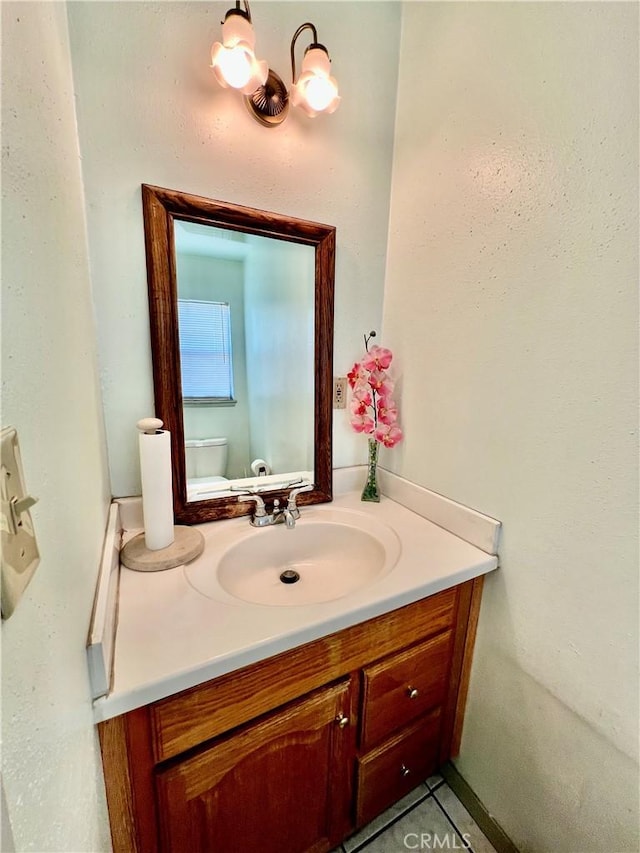 8675 Colorado Ave, Riverside, CA 92504 - half bath featuring vanity and toilet