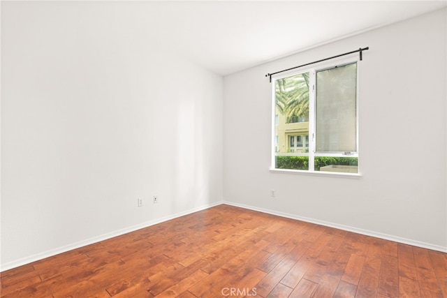 6400 Crescent E Unit 121, Playa Vista, CA 90094 - empty room with hardwood / wood-style flooring and baseboards