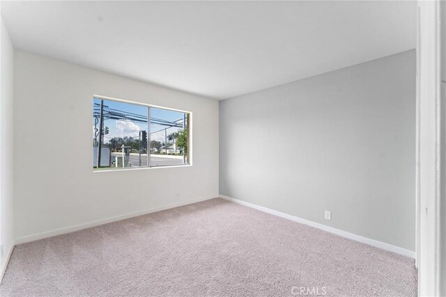 558 W Philadelphia St, Ontario, CA 91762 - unfurnished room featuring carpet flooring and baseboards