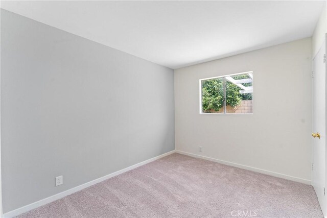 558 W Philadelphia St, Ontario, CA 91762 - unfurnished room with carpet flooring and baseboards
