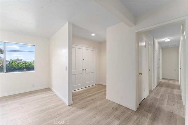 558 W Philadelphia St, Ontario, CA 91762 - hall featuring light wood-type flooring and recessed lighting
