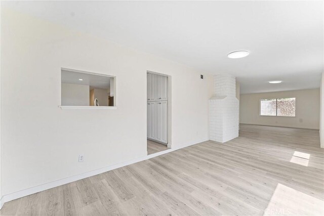 558 W Philadelphia St, Ontario, CA 91762 - spare room with wood finished floors