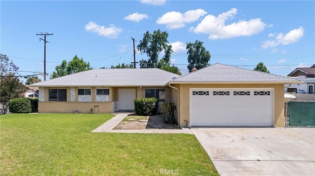 558 W Philadelphia St, Ontario, CA 91762 - ranch-style house with an attached garage, stucco siding, and concrete driveway