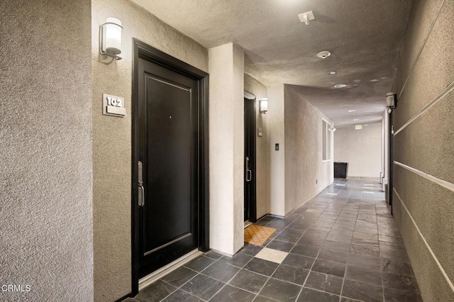 4424 Whitsett Ave Unit 102, Studio City, CA 91604 - corridor featuring a textured wall