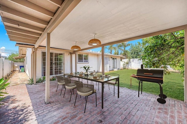 626 N Fig St, Escondido, CA 92025 - fenced backyard featuring a patio, grilling area, and outdoor dining area