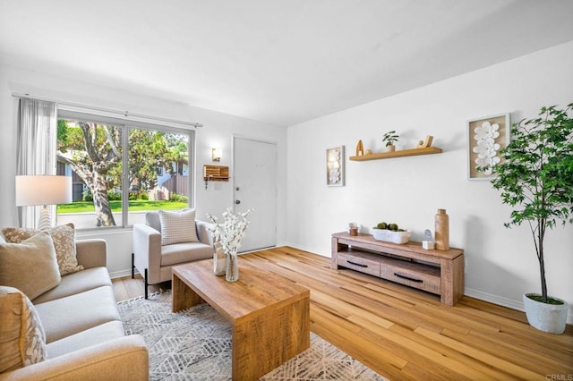 6660 Bell Bluff Ave Unit A, San Diego, CA 92119 - living area featuring light wood-type flooring and baseboards