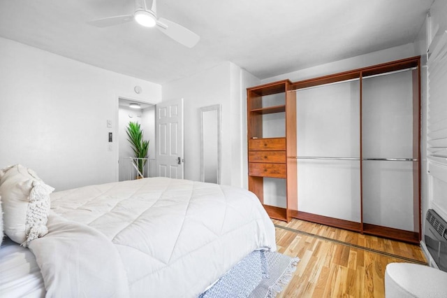 6660 Bell Bluff Ave Unit A, San Diego, CA 92119 - bedroom with wood finished floors, a closet, and a ceiling fan