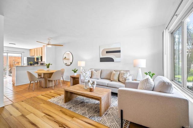 6660 Bell Bluff Ave Unit A, San Diego, CA 92119 - living area featuring light wood-style flooring and a ceiling fan