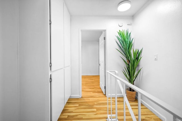 6660 Bell Bluff Ave Unit A, San Diego, CA 92119 - corridor featuring light wood-type flooring and baseboards