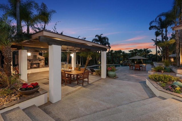 9 Rolling View Ln, Fallbrook, CA 92028 - view of patio / terrace with an outdoor stone fireplace, a gazebo, and outdoor dining space