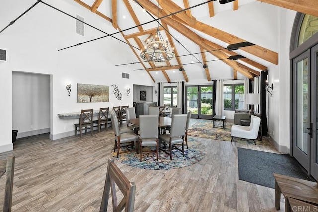 9 Rolling View Ln, Fallbrook, CA 92028 - dining space with high vaulted ceiling, beam ceiling, a chandelier, and wood finished floors
