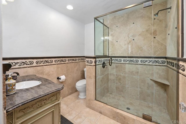 9 Rolling View Ln, Fallbrook, CA 92028 - full bathroom with a stall shower, vanity, tile patterned flooring, tile walls, and a wainscoted wall