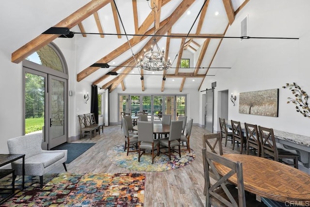 9 Rolling View Ln, Fallbrook, CA 92028 - dining room featuring high vaulted ceiling, beam ceiling, a chandelier, wood finished floors, and a barn door