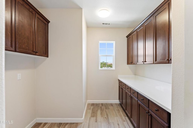 1655 Range Rd, Oxnard, CA 93036 - laundry room featuring light wood-type flooring
