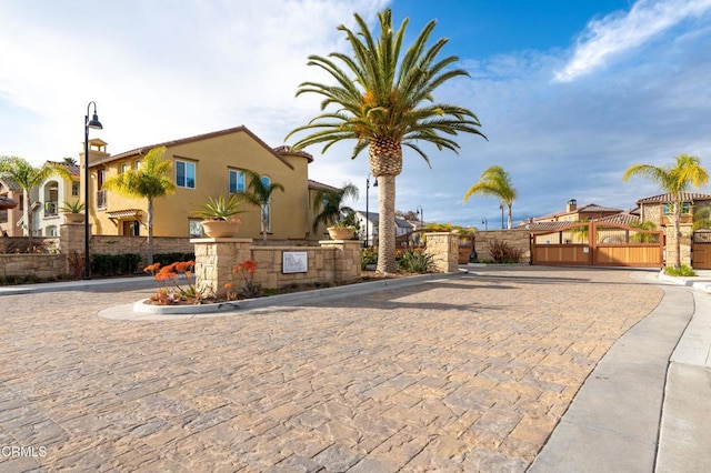 1655 Range Rd, Oxnard, CA 93036 - view of street featuring a gate, a gated entry, curbs, and a residential view