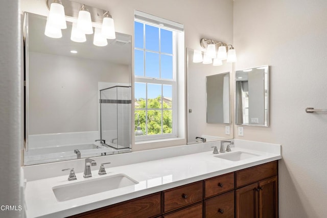 1655 Range Rd, Oxnard, CA 93036 - full bathroom featuring double vanity, a shower stall, and a garden tub