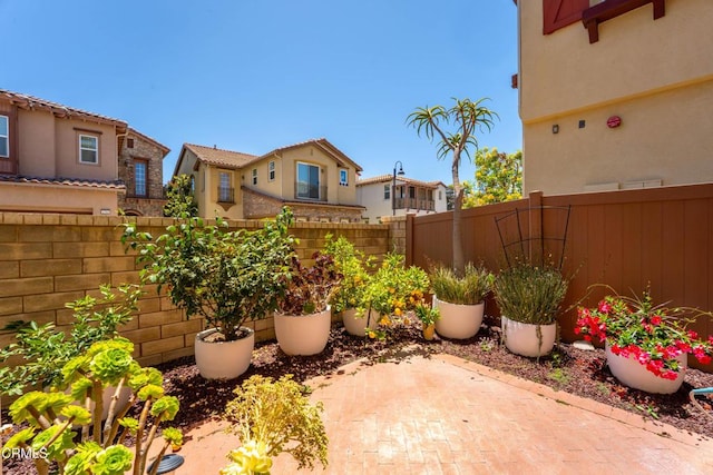 1655 Range Rd, Oxnard, CA 93036 - fenced backyard with a patio area