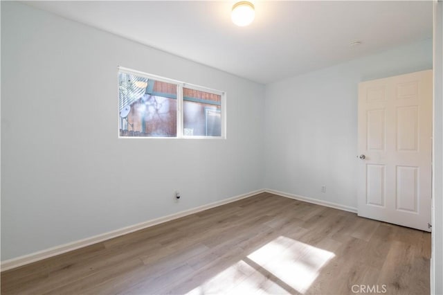 1044 E Country Club Blvd, Big Bear City, CA 92314 - spare room featuring light wood finished floors and baseboards