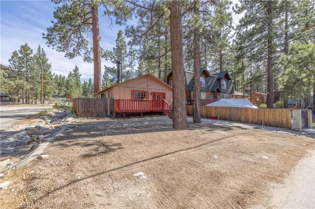 1044 E Country Club Blvd, Big Bear City, CA 92314 - view of side of home featuring a wooden deck