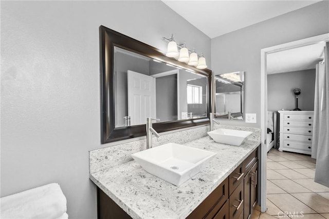 1571 S Reservoir St Unit C, Pomona, CA 91766 - bathroom featuring double vanity and tile patterned floors