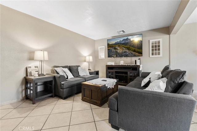 1571 S Reservoir St Unit C, Pomona, CA 91766 - living room with light tile patterned flooring and baseboards