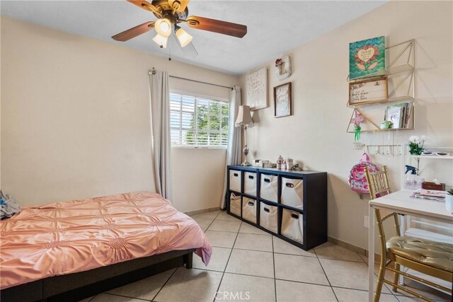 1571 S Reservoir St Unit C, Pomona, CA 91766 - bedroom featuring light tile patterned flooring and a ceiling fan
