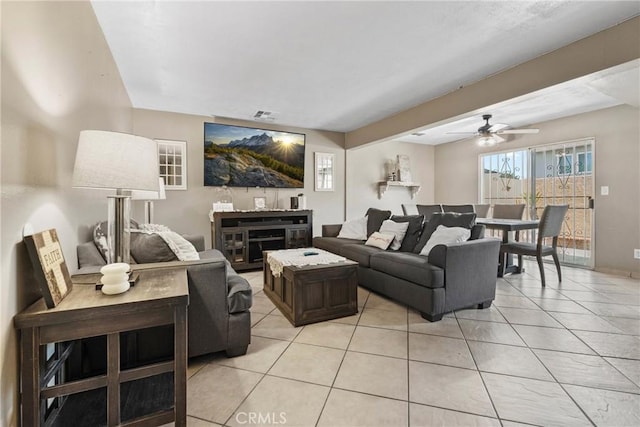 1571 S Reservoir St Unit C, Pomona, CA 91766 - living room with light tile patterned floors and ceiling fan