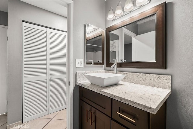 1571 S Reservoir St Unit C, Pomona, CA 91766 - bathroom featuring vanity, a closet, and tile patterned floors
