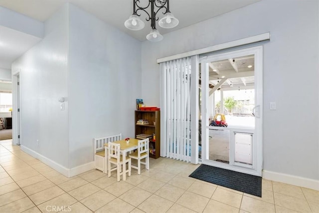 6195 Via Huerto Ct, Atascadero, CA 93422 - tiled dining space featuring a chandelier and healthy amount of natural light