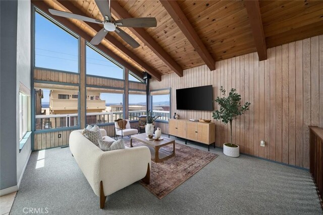 1565 Strand Way, Oceano, CA 93445 - carpeted living room featuring a ceiling fan, healthy amount of natural light, wooden ceiling, and wood walls