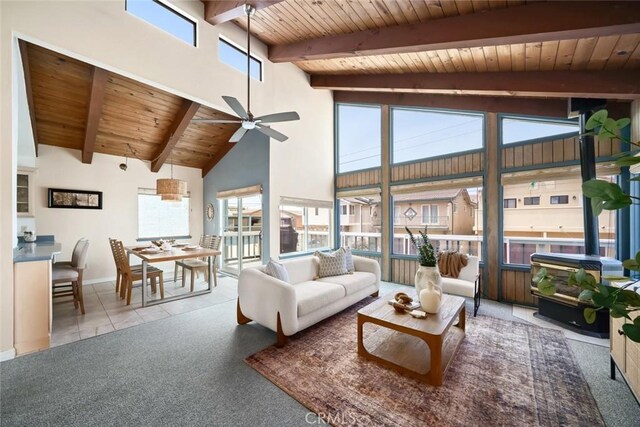 1565 Strand Way, Oceano, CA 93445 - living room featuring a wood ceiling with exposed beams, ceiling fan, high vaulted ceiling, and carpet floors