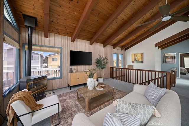 1565 Strand Way, Oceano, CA 93445 - living room with a wood stove, carpet flooring, wood ceiling, and ceiling fan
