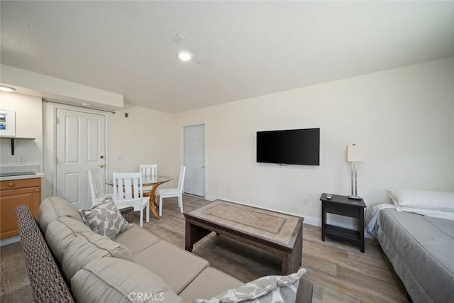 1565 Strand Way, Oceano, CA 93445 - living room featuring light wood finished floors and recessed lighting