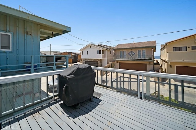 1565 Strand Way, Oceano, CA 93445 - wooden terrace featuring a residential view, a garage, and area for grilling