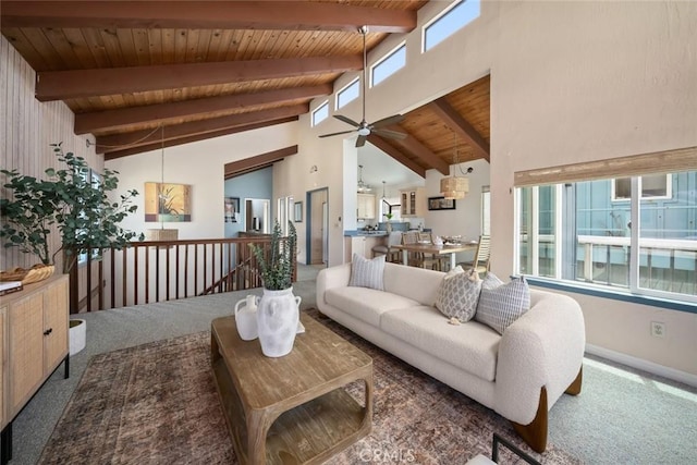 1565 Strand Way, Oceano, CA 93445 - carpeted living area featuring a wood ceiling with exposed beams, a ceiling fan, and high vaulted ceiling