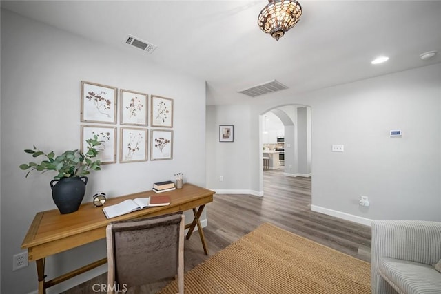 2636 Vineyard Cir, Paso Robles, CA 93446 - office featuring arched walkways, wood finished floors, and recessed lighting