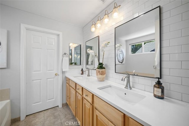 2636 Vineyard Cir, Paso Robles, CA 93446 - bathroom featuring double vanity, a tub to relax in, tile patterned floors, and backsplash