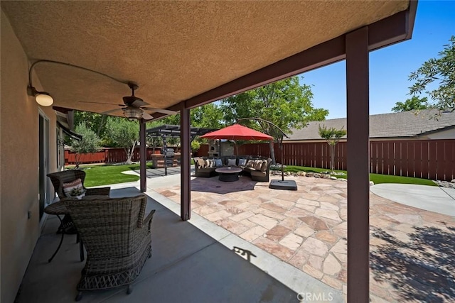 2636 Vineyard Cir, Paso Robles, CA 93446 - fenced backyard featuring an outdoor living space, a patio area, and a ceiling fan