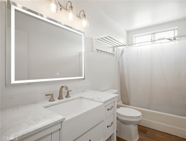477 S Maidstone St, Banning, CA 92220 - full bathroom featuring vanity, shower / tub combo, and wood finished floors
