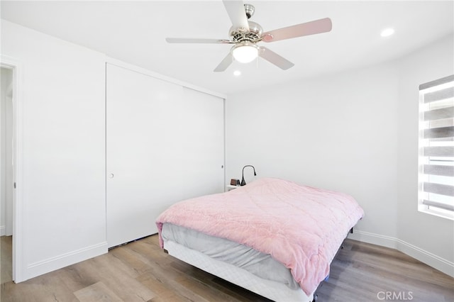 477 S Maidstone St, Banning, CA 92220 - bedroom with light wood-type flooring, a closet, recessed lighting, and ceiling fan