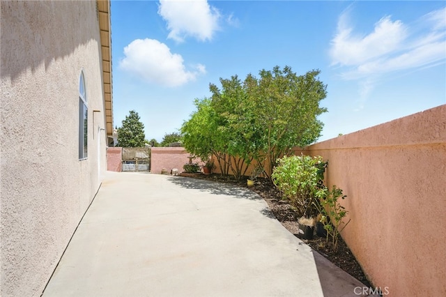477 S Maidstone St, Banning, CA 92220 - fenced backyard with a patio area