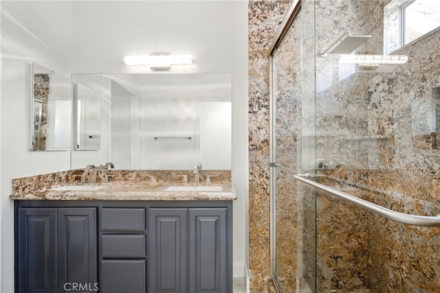 477 S Maidstone St, Banning, CA 92220 - bathroom with a shower stall and double vanity