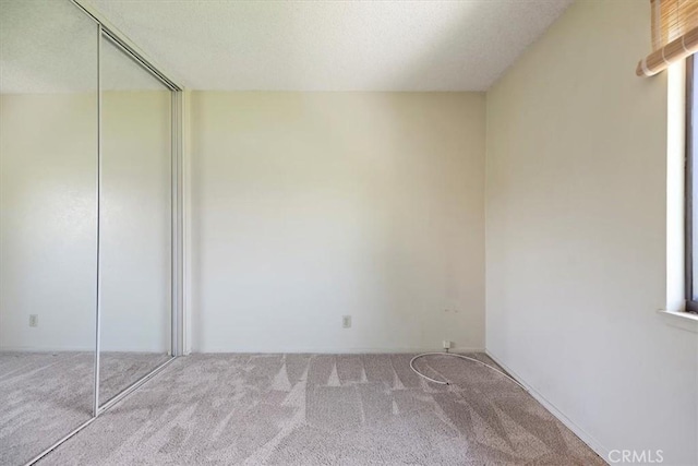 2829 Irving St, Riverside, CA 92504 - unfurnished bedroom with carpet flooring and a closet