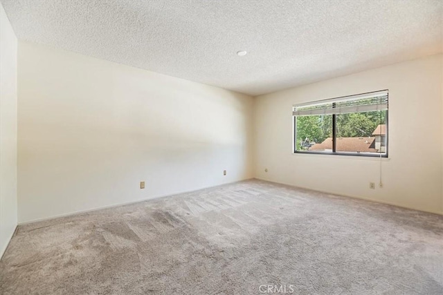 2829 Irving St, Riverside, CA 92504 - carpeted spare room with a textured ceiling