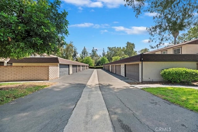 2829 Irving St, Riverside, CA 92504 - view of concrete road with community garages